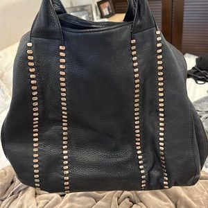 Kelsi Dagger black and gold purse